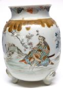 Japanese porcelain vase on three stud feet decorated with Samurai in a landscape setting with