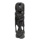 Carved wooden Oriental figure, 28cm high