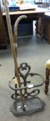 Small Victorian wrought iron stick and umbrella stand with scrolled back and dished shaped