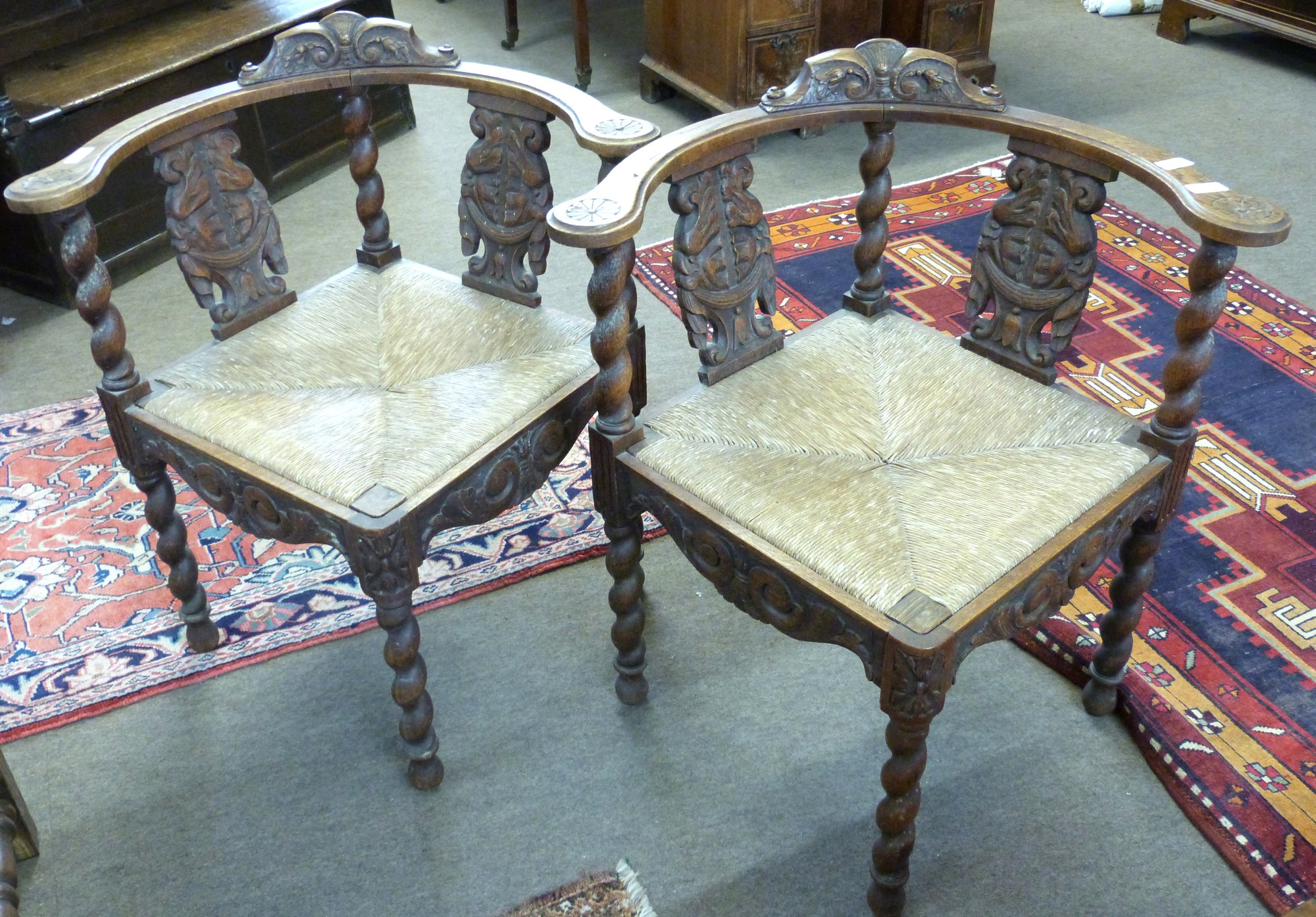 Pair of late 19th/early 20th century carved oak corner chairs with curved backs, barley twist - Image 2 of 2