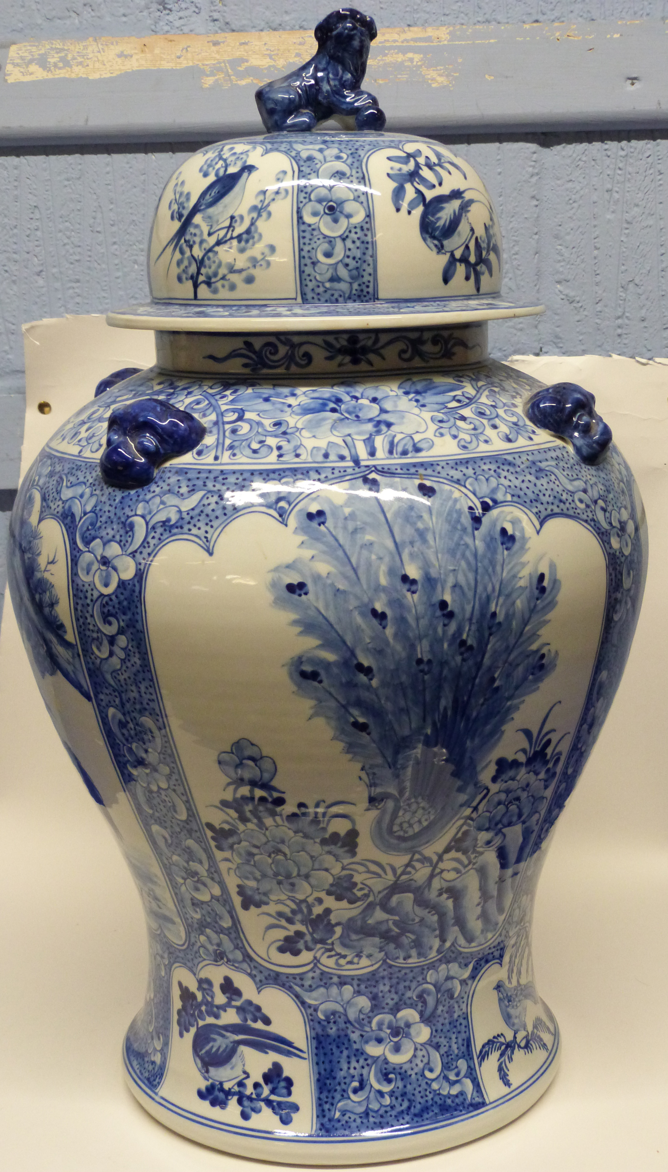 Large Chinese porcelain jar and cover modelled with panels of flowers and alternating panels of