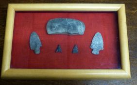 Framed set of pre-historic arrow heads