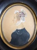 Victorian silhouette of a lady set into a black wooden frame, 17cm long