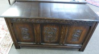 20th century carved oak coffer, two figure of eight and central diamond relief panels to front,