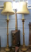 Good quality pair of carved gilt wood lamp standards in Orientalist taste with leaf carved and