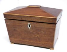 Regency style caddy with ivory inlaid escutcheon and wooden bun feet, 19cm long