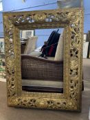 20th century pierced gilt gesso picture frame, the recess 56 x 80cm