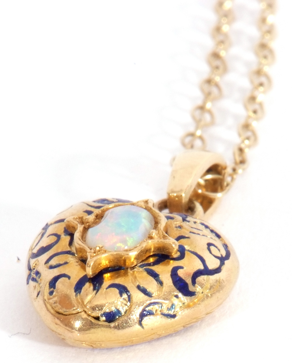 Yellow metal, opal and blue enamel pendant, heart shaped centring an oval opal in an engraved - Image 6 of 8