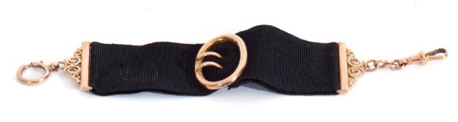 Vintage "Ribbon" fob, the black ribbon with a 9ct stamped buckle and mounts, 14cm long, g/w 4.5gms