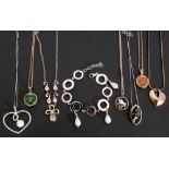 Mixed Lot: white metal jewellery to include four heart pendant necklaces, disc and bead bracelet,