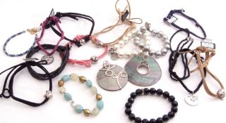 Mixed Lot: to include eight "hot diamonds" cord bracelets, each with a 925 slider/charm, highlighted