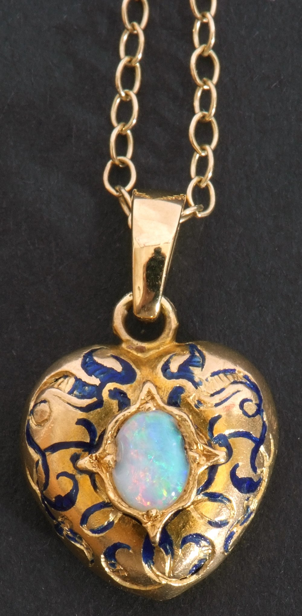 Yellow metal, opal and blue enamel pendant, heart shaped centring an oval opal in an engraved - Image 3 of 8