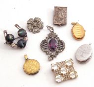 Mixed Lot: four metal lockets, an 800 stamped paste set open work pendant, together with three other