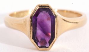 Mid-20th century 18ct gold and amethyst ring, the oval faceted amethyst in a rub-over setting,