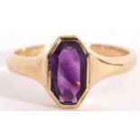 Mid-20th century 18ct gold and amethyst ring, the oval faceted amethyst in a rub-over setting,
