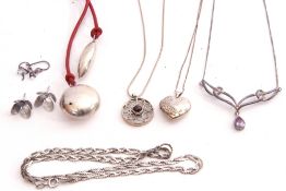 Mixed Lot: white metal jewellery to include a heart locket and chain, a cord and white metal