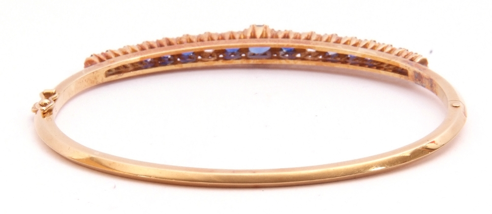 Sapphire and diamond hinged bracelet, the raised pierced gallery set with 13 round faceted sapphires - Image 4 of 6