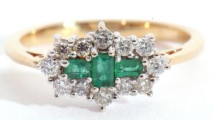 An emerald and diamond cluster ring, centring three small stepped cut emeralds within a small