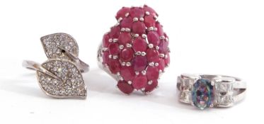 Mixed Lot: three white metal 925 marked rings, ruby cluster ring, paste set cross over