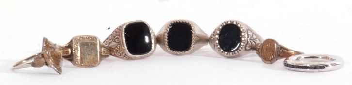 Mixed Lot: seven white metal rings, enamel, onyx and paste set examples