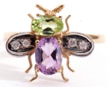 Modern 9ct gold insect ring, the head set with an peridot and an oval amethyst body with diamond set