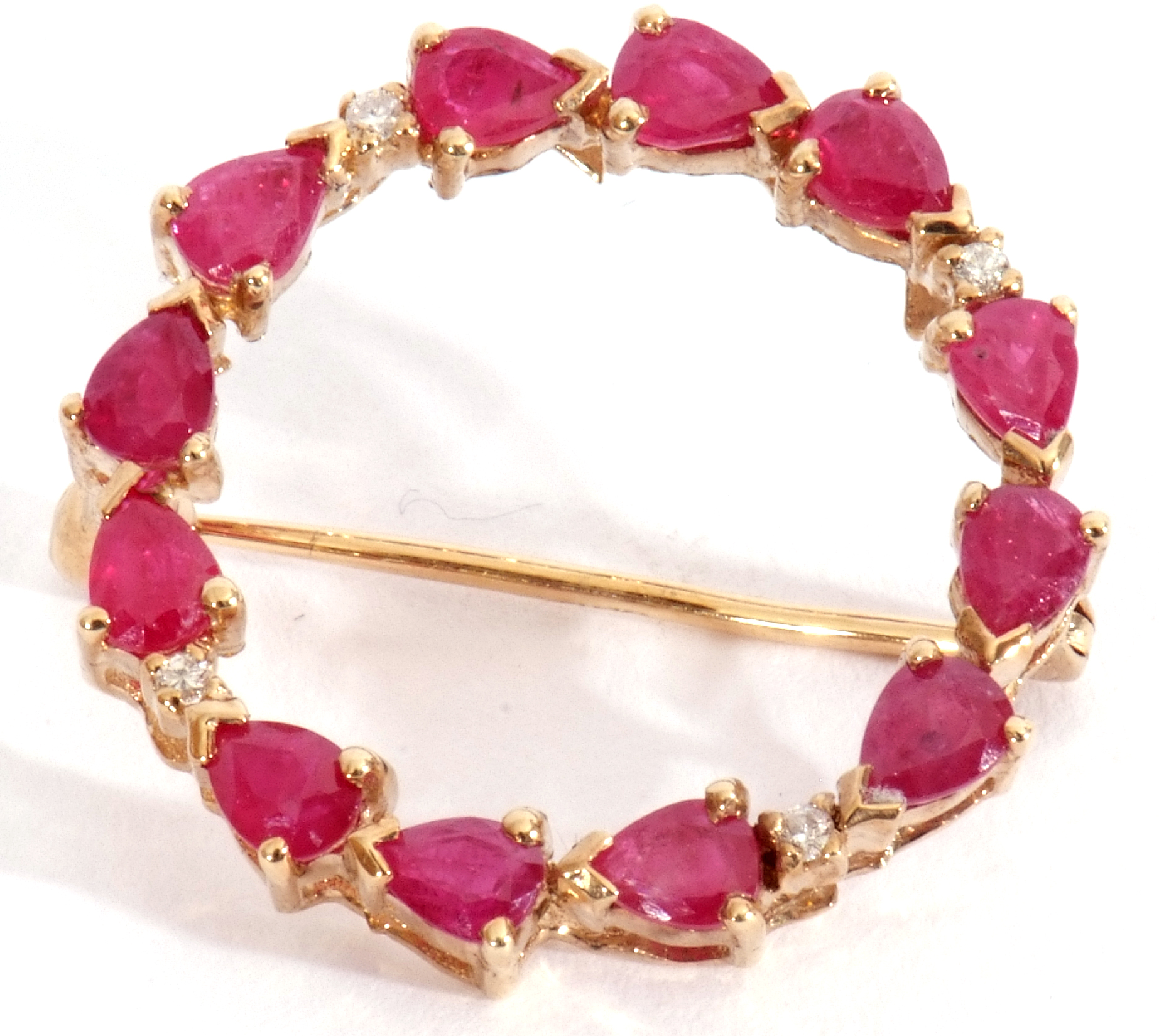 9ct gold ruby and diamond brooch, a garlanded design with groups of three pear shaped rubies, - Image 2 of 4