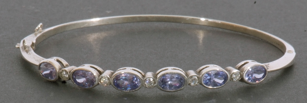 Modern pale sapphire and diamond set hinged bracelet, featuring six oval faceted pale sapphires in - Image 4 of 6