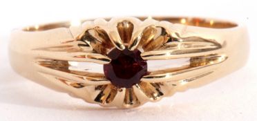 Single stone ring, the split shank centring a small round cognac citrine, plain polished mount