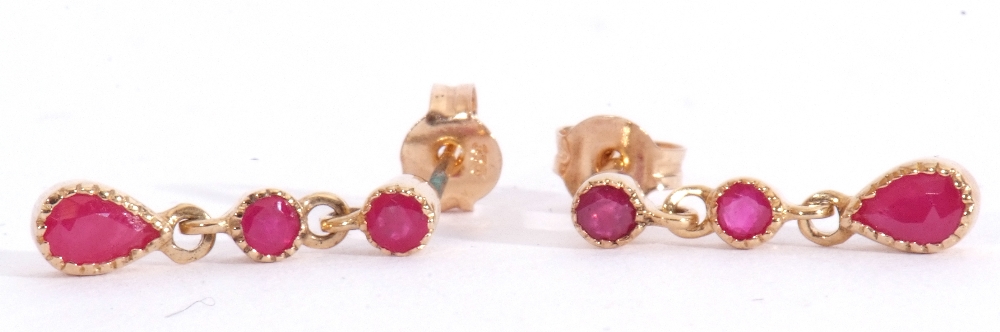 Pair of ruby drop earrings, a design featuring two round cut rubies with an oval ruby - Image 4 of 4