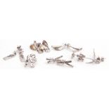 Mixed Lot: seven pairs of white metal earrings highlighted with small single cut diamond(s), each