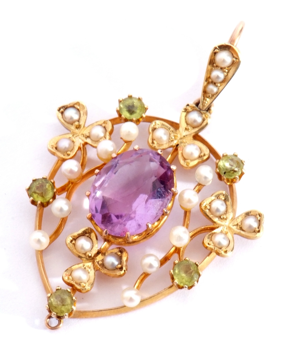 Amethyst, peridot and seed pearl open work pendant centring an oval multi-claw set faceted - Image 5 of 5