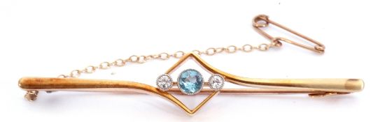 Aquamarine and diamond set bar brooch, the centre an offset square frame featuring a round faceted