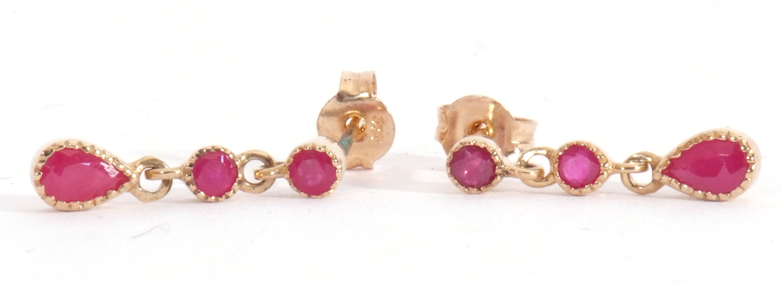 Pair of ruby drop earrings, a design featuring two round cut rubies with an oval ruby - Image 2 of 4