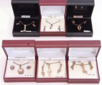 Mixed Lot: six white metal necklace and matching earring sets