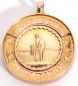 9ct gold cricket medallion of circular form, the centre with a batsman and stumps, engraved edge "D.