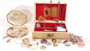 Large box of costume jewellery to include brooches, rings etc