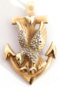 9ct gold and diamond pendant, a design featuring an anchor, an eagle with outstretched wings,