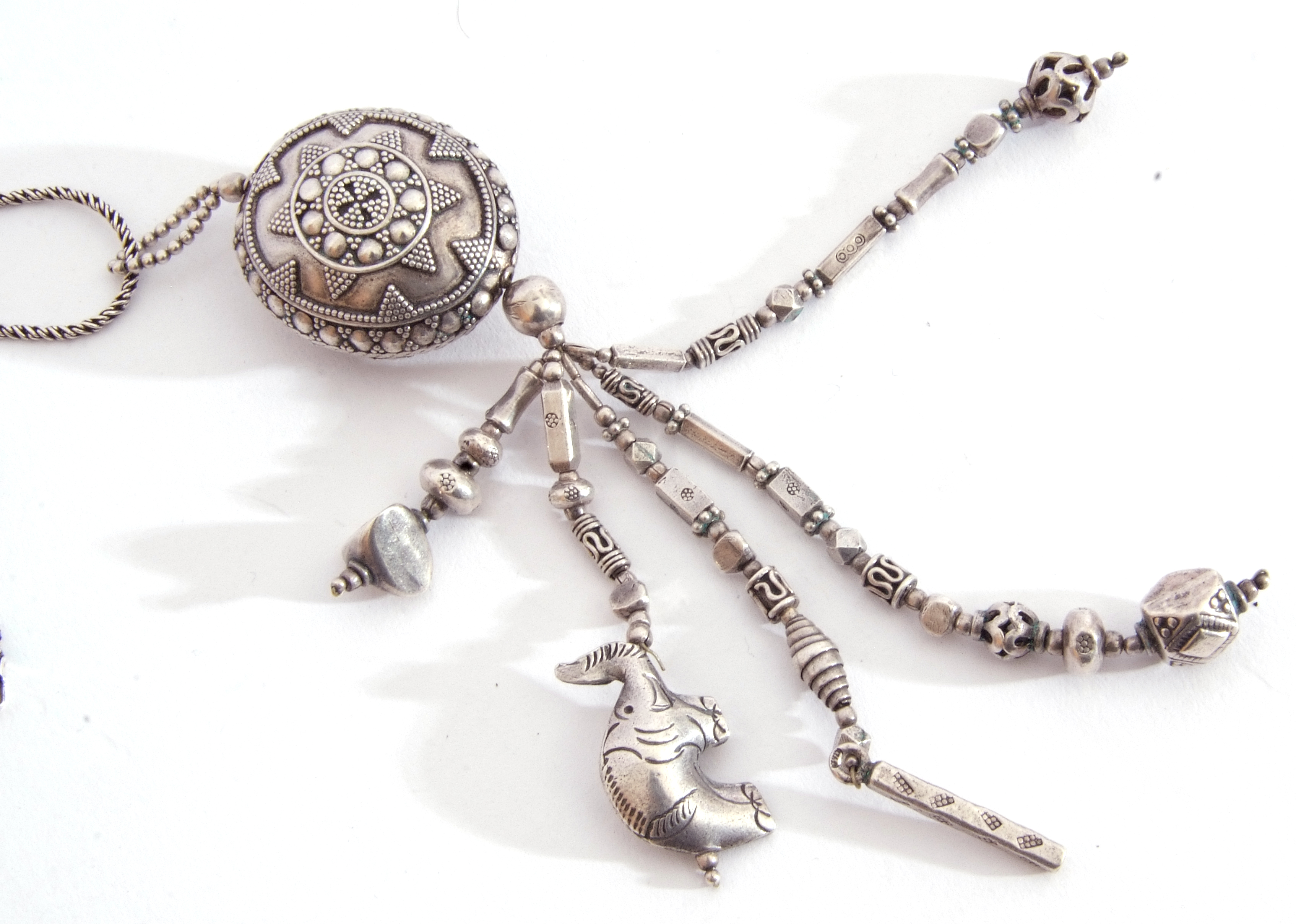 Mixed Lot: white metal pendant necklace, the oval shaped bead decorated pendant supporting below - Image 2 of 2