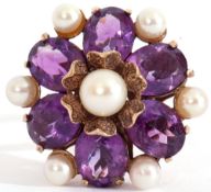 Large amethyst and pearl dress ring, a flowerhead design centring a cultured pearl raised by six