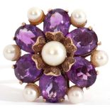 Large amethyst and pearl dress ring, a flowerhead design centring a cultured pearl raised by six
