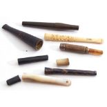 Mixed Lot: comprising an early 20th century cased Dunhill cigarette holder of sliding form with