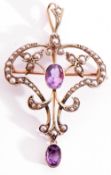 Amethyst and seed pearl openwork pendant centring an oval faceted amethyst in a cut down bezel and