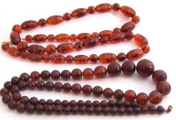 Mixed Lot: two long lengths of amber type beads (2)