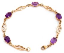 Modern 375 stamped amethyst bracelet featuring five oval faceted amethysts in cut down settings