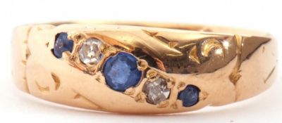 Late Victorian 18ct gold sapphire and diamond ring, alternate set with three graduated round cut