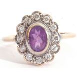 9ct gold amethyst and diamond cluster ring a design featuring an oval cut amethyst raised in cut