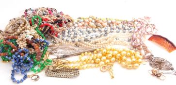 Large quantity of costume jewellery to include necklace, brooches, earrings etc