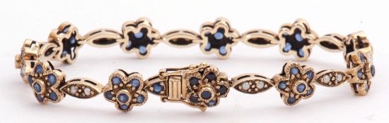 9ct gold sapphire and seed pearl bracelet featuring 21 links alternating with 11 sapphire clusters