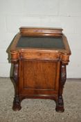19TH CENTURY DAVENPORT WITH CARVED SUPPORTS AND LEATHER INSET TOP, COMPLETE WITH INK BOTTLES ETC,