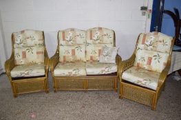 THREE PIECE CANE CONSERVATORY SUITE COMPRISING TWO SEATER SOFA AND TWO ARMCHAIRS, THE SOFA APPROX